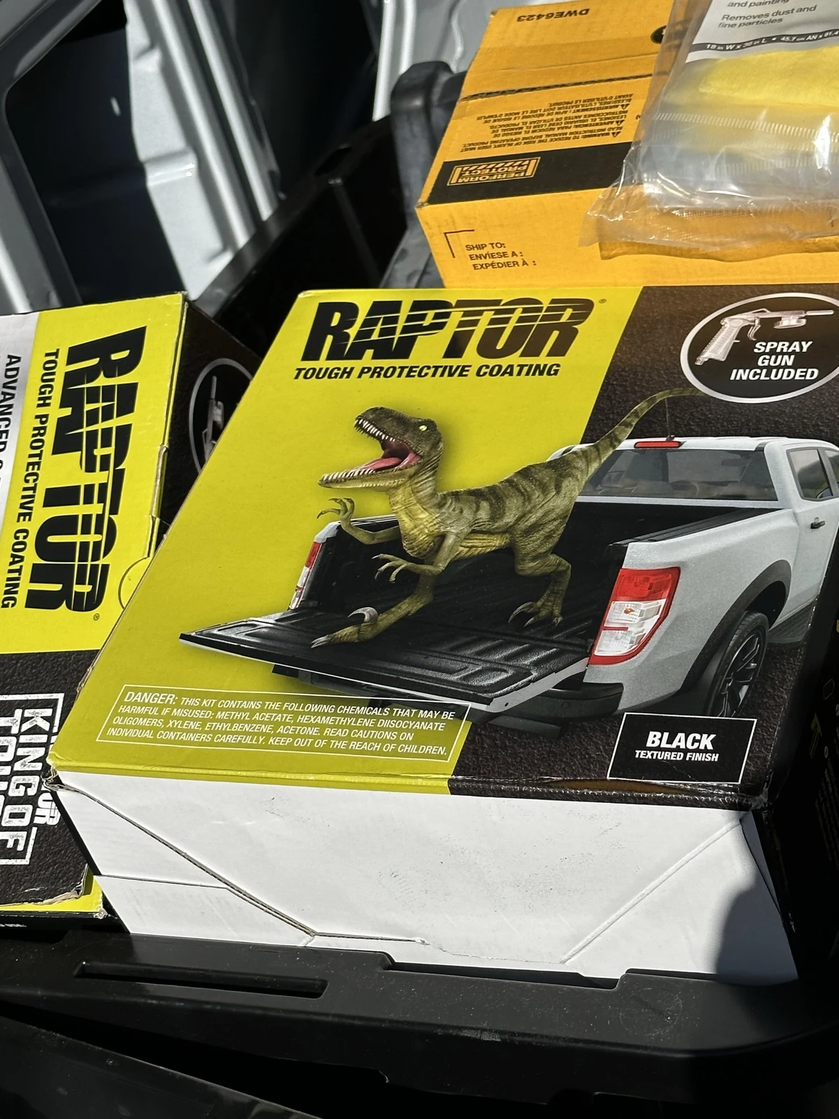 Black RAPTOR coating packaging from my project, marked spray gun included.