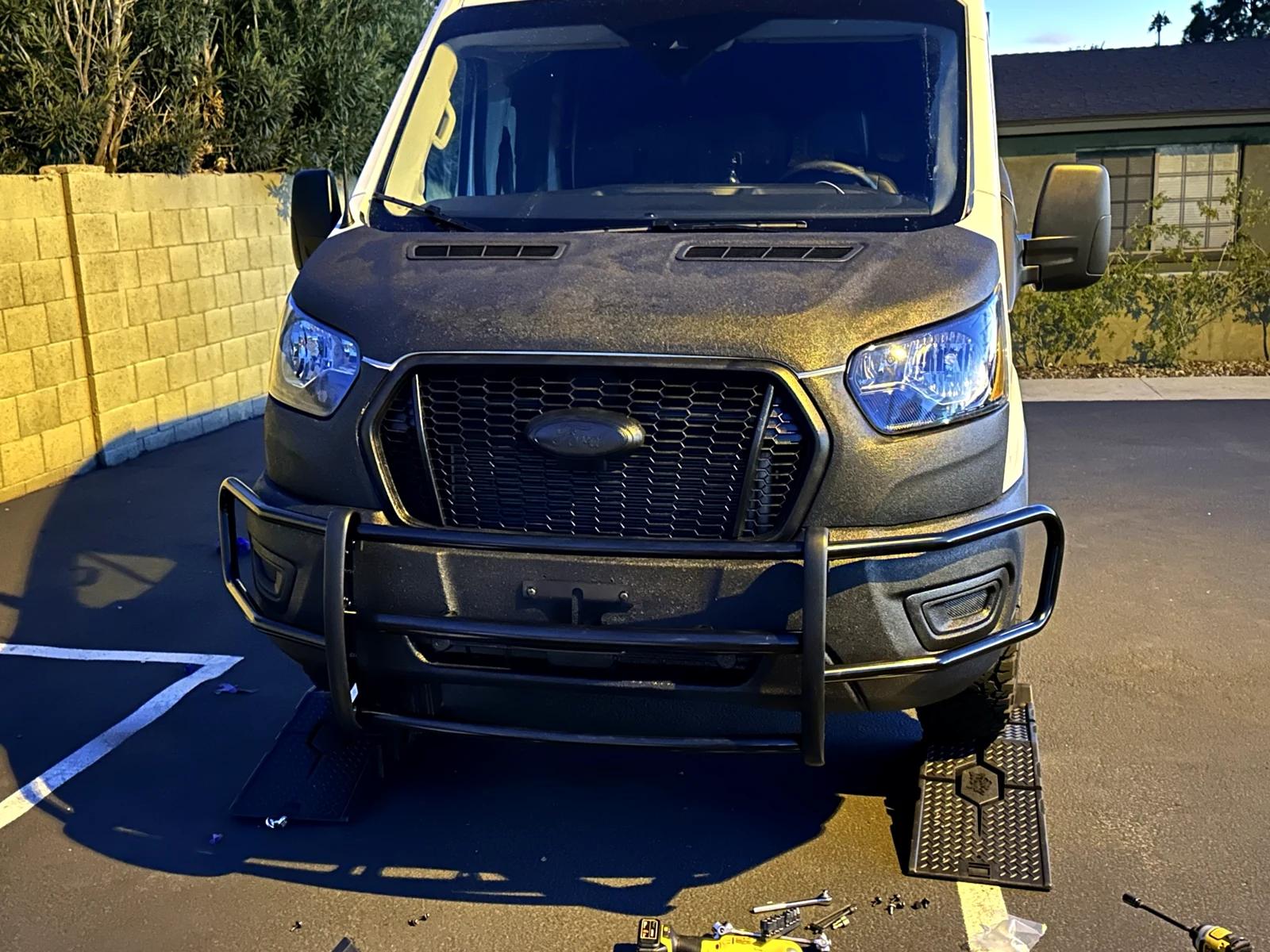 Completed black front grille guard with both outer headlamp wings fitted on my Transit