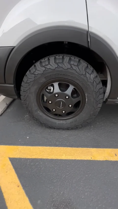 Installed front Method wheel and BFGoodrich tire beneath the Transit’s front wheel arch.