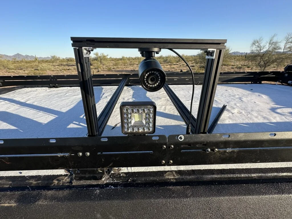 A roof camera mount assembled from extrusion, custom brackets and hardware.