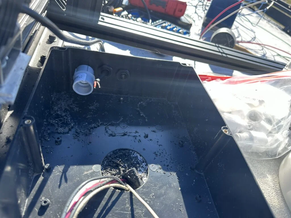 The large enclosure and the opening used to bring the roof wiring into my van.