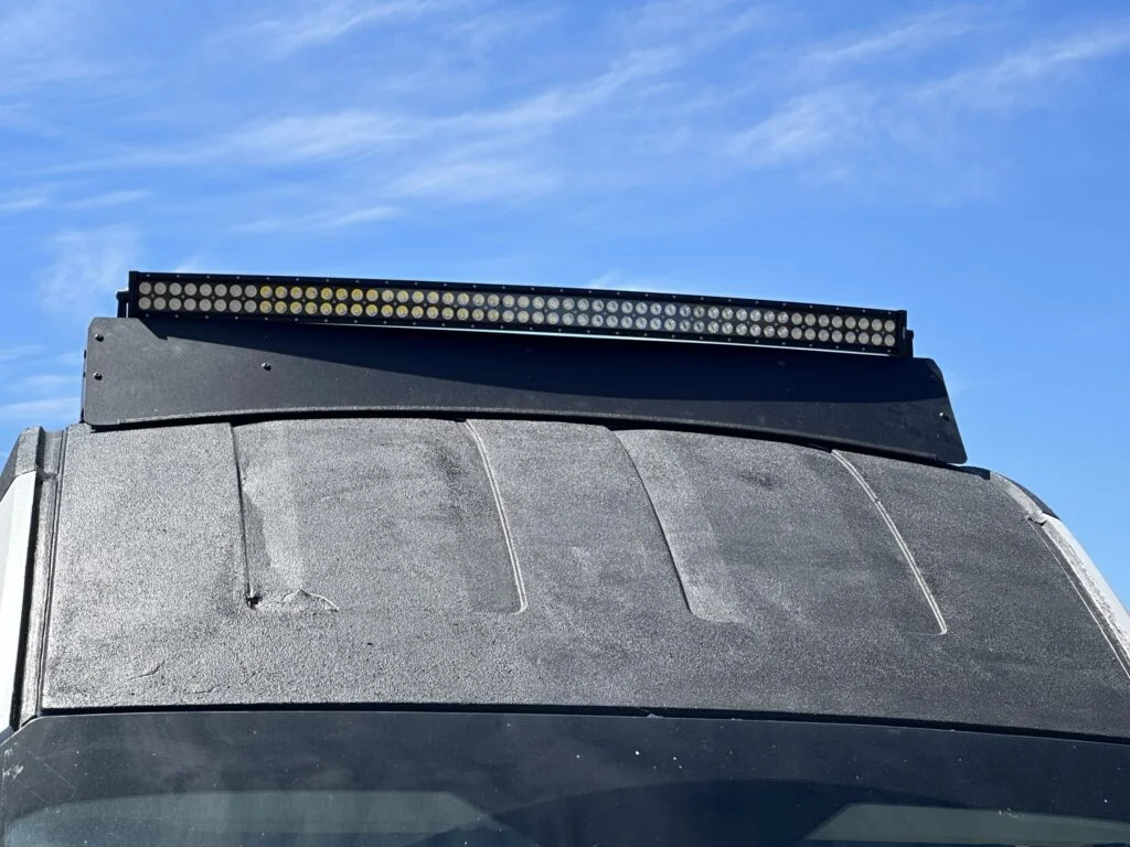 The light bar mounted above the front roof-rack area after that fitting session.