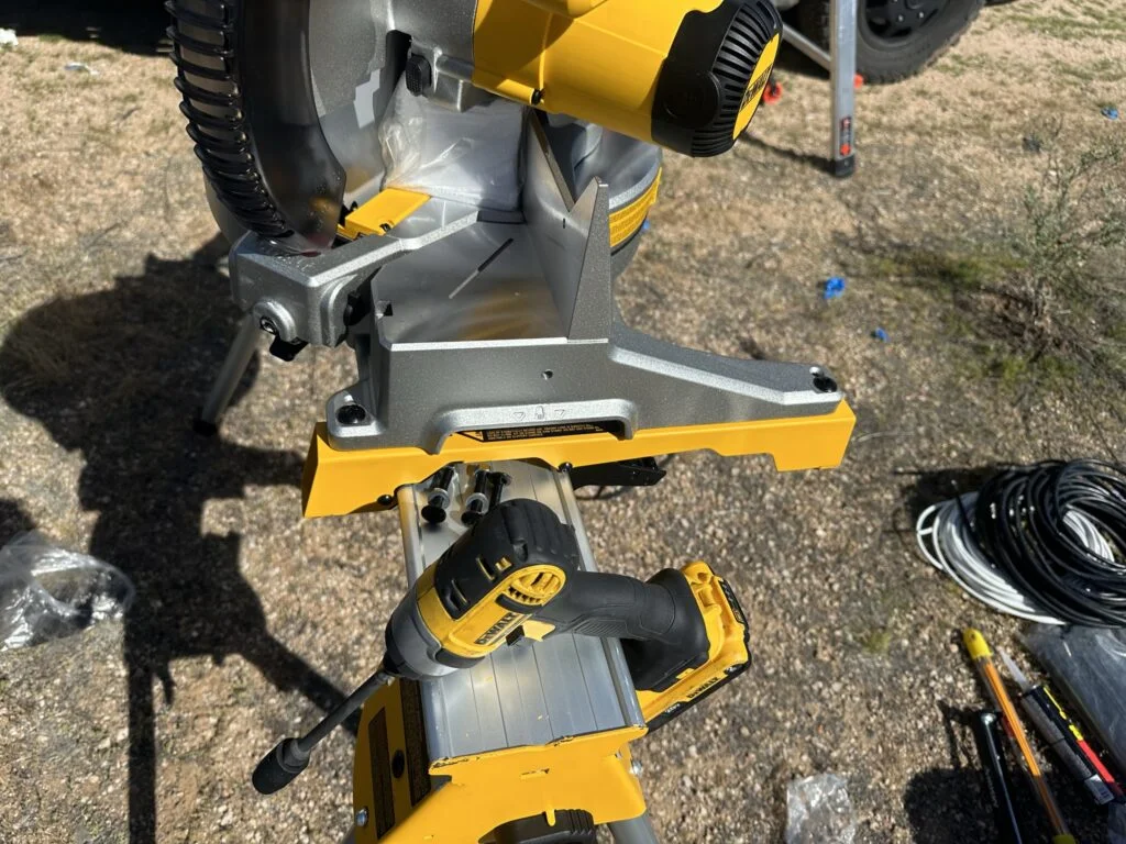 My DEWALT miter saw and stand during the light-bar mounting work.
