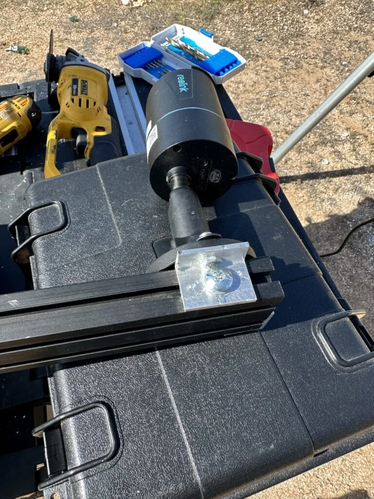 The camera base and custom bracket during fitting to the extrusion.