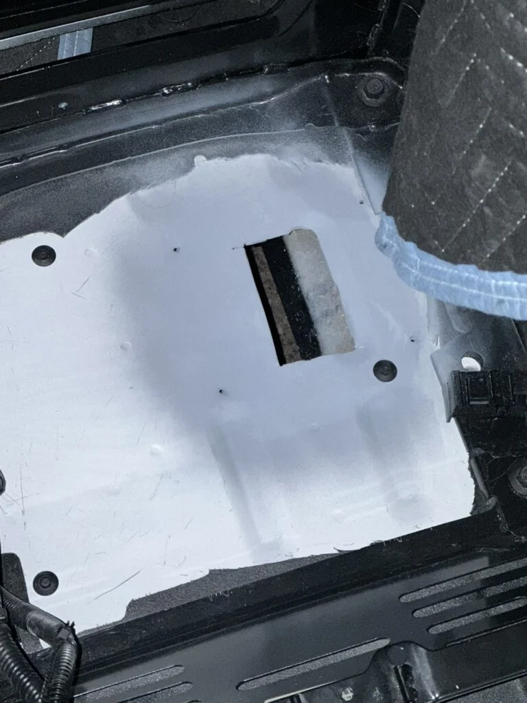 Primer around the cut opening beneath my passenger seat.