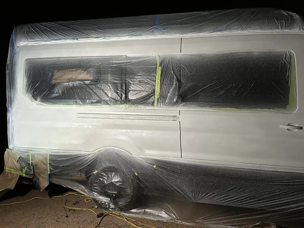 The side of the van during the white-bedliner project.